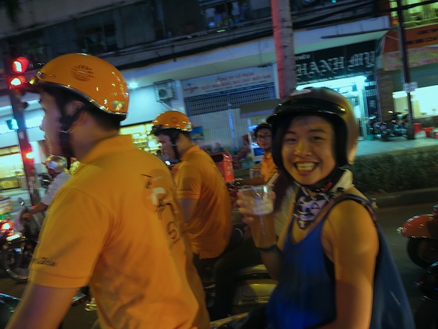 Touring the city on a Vespa with a beer in my hand. I love Ho Chi Minh City!