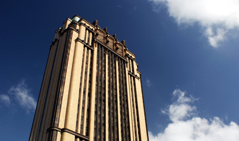 Ominous and grand in architecture, this building is home to offices and even a gallery. Photography: teddy-rised via flickr