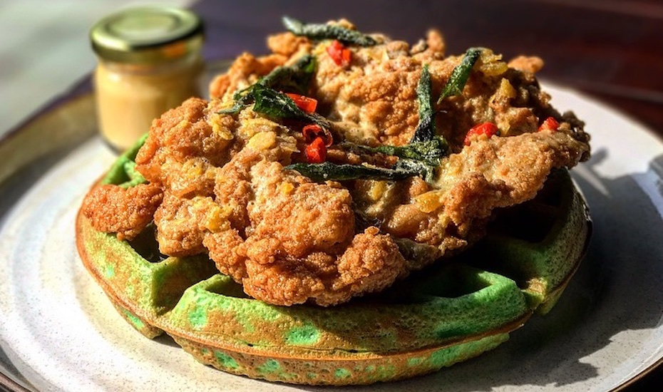 Salted egg yolk chicken and pandan waffles (Photography via The Beast)
