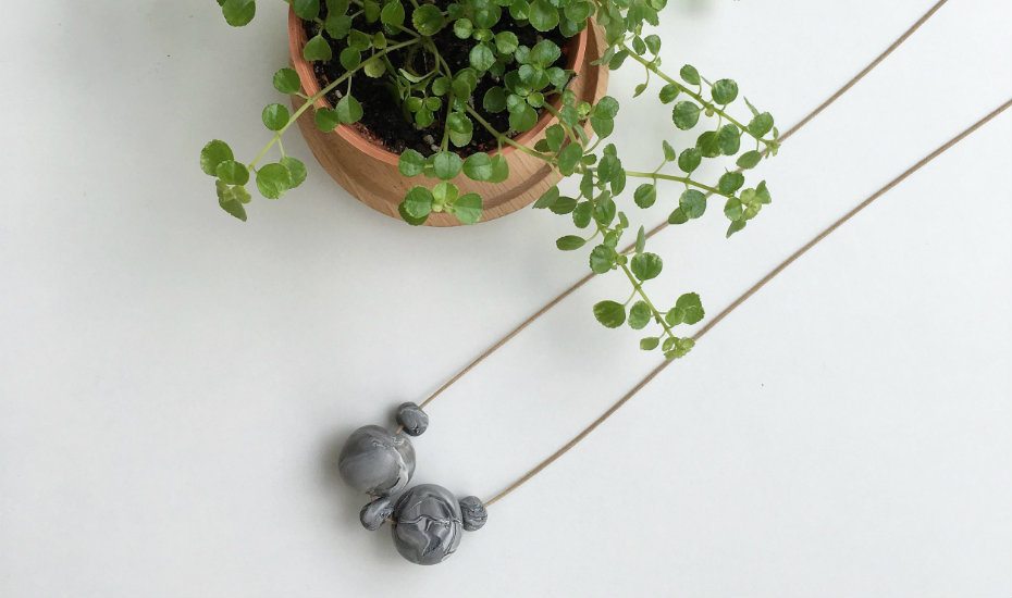 Statement polymer clay jewellery and accessories for a playful ensemble