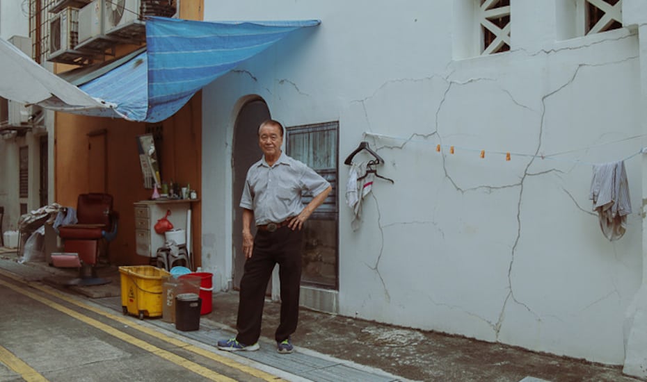 Mr Lee posing for the camera