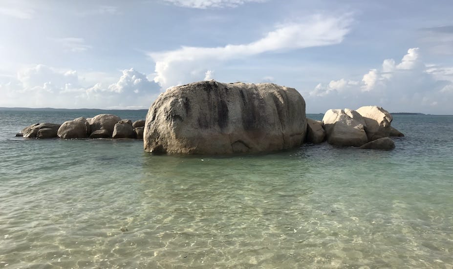 Boulders in the sea at Cempedak Private Island