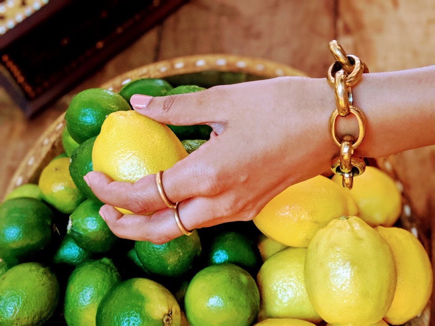Chetna Bhatt of Ashepa Lifestyle wears the Zulu bracelet and Classic brass rings.