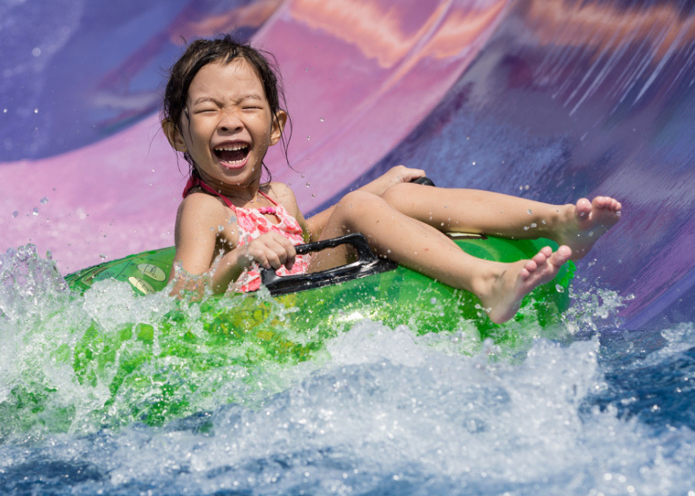 Kid on a water park ride