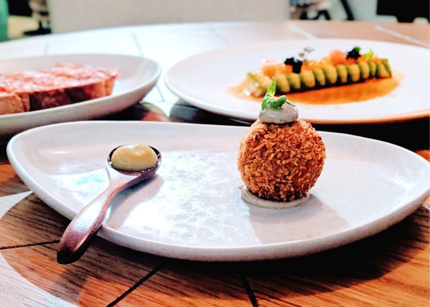 Here’s the curious spherical olive and the lobster avo roll in the background.