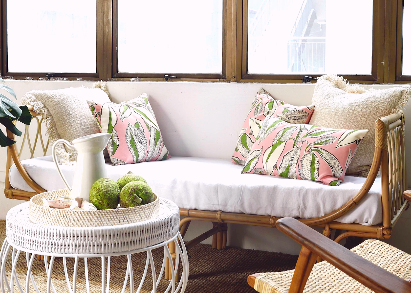 Items featured: Rattan and iron tray table, rattan island daybed and cushions from Island Living. Photography: Island Living