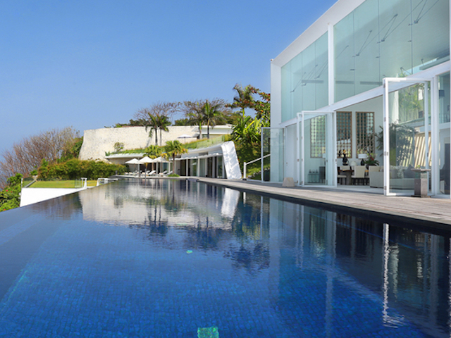 Dive straight into the infinity pool from your bedroom at Villa Latitude, Bali