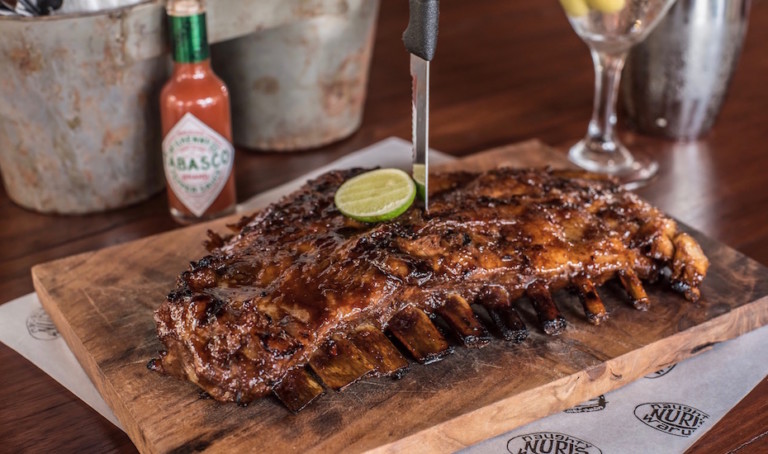 Ribs in Bali: Pig out in Seminyak at the REAL Naughty Nuri’s Warung for a lip-smacking rib fix and knock-out martinis.