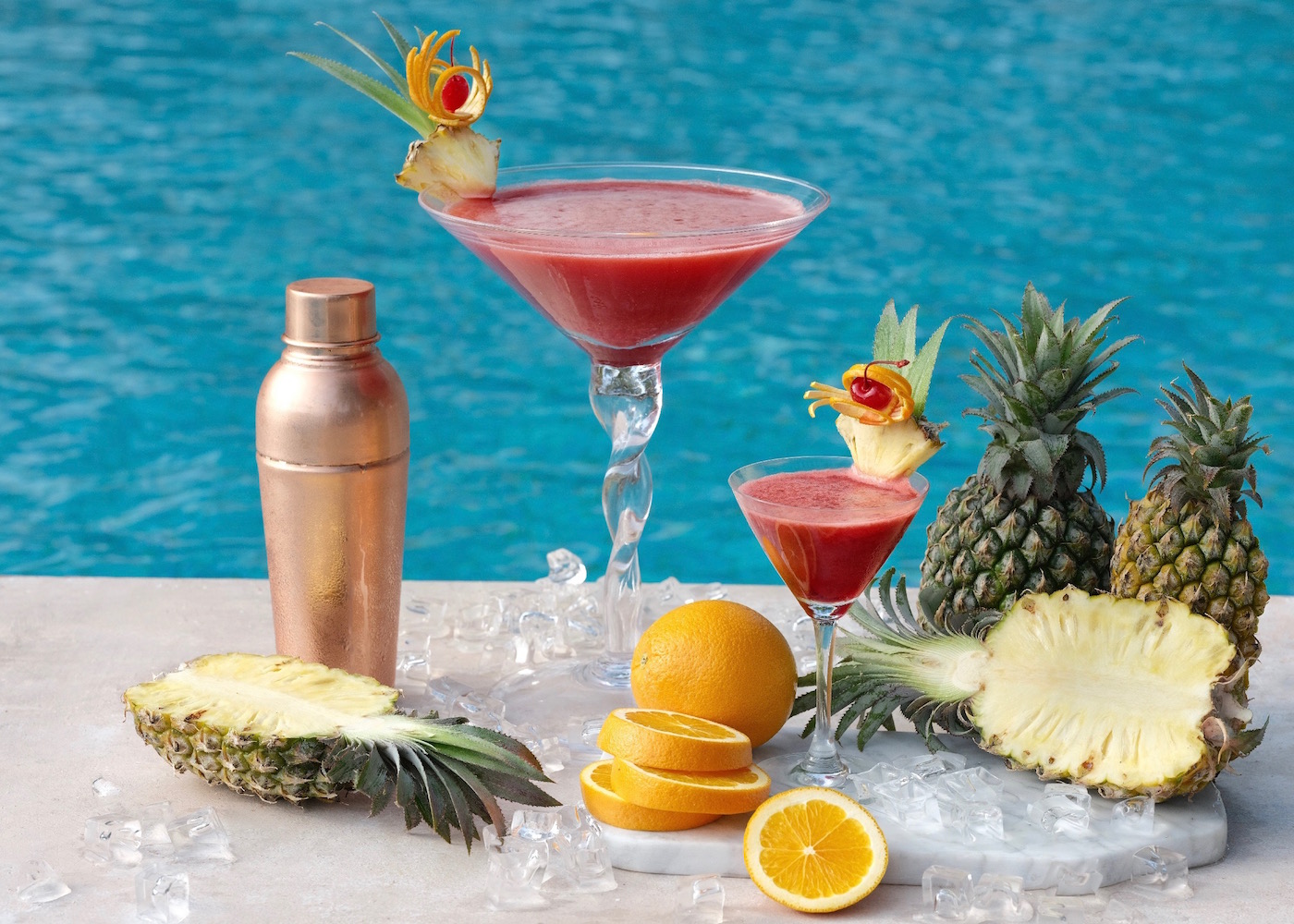 The signature Giant Martini by the swimming pool at S.K.A.I. Beach Club at Padma Resort Legian in Bali, Indonesia