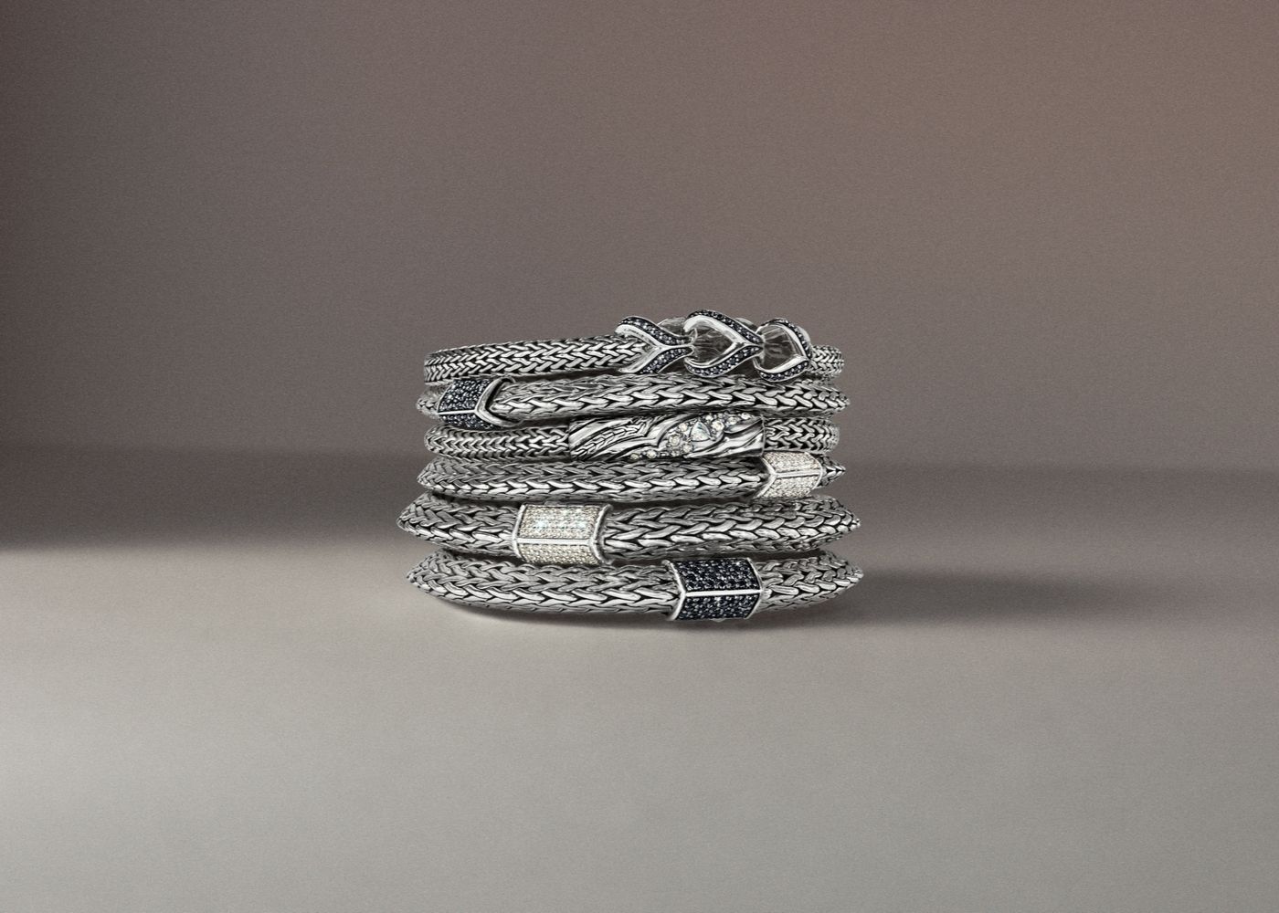 John Hardy's new Tiga Classic Chain collection features a modern pyramidal form and reimagined double-faceted clasp