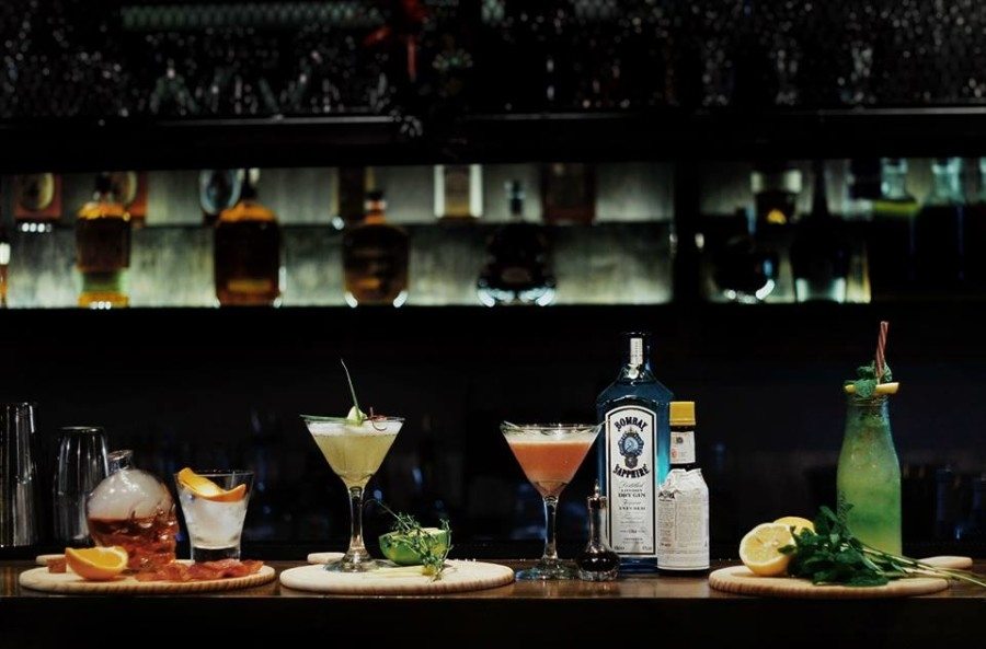 dive bars in Wan Chai Moonshine & Po'Boys cocktails on the bar