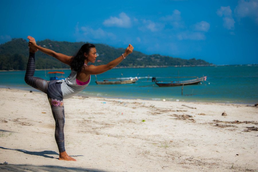 Cristins McLauchlan founder of The Vibe Tribe doing yoga