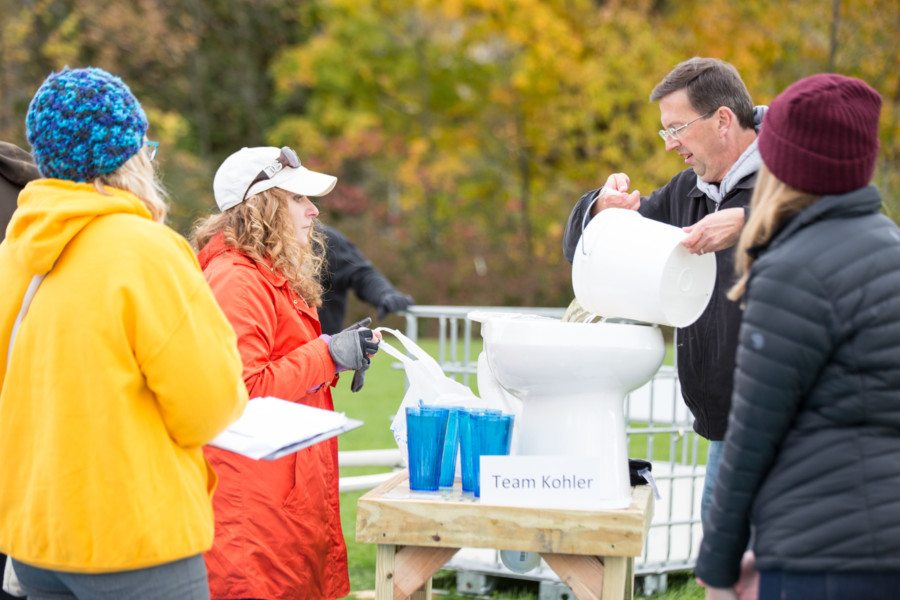 Rob Zimmerman Kohler working with students on eco-friendly design