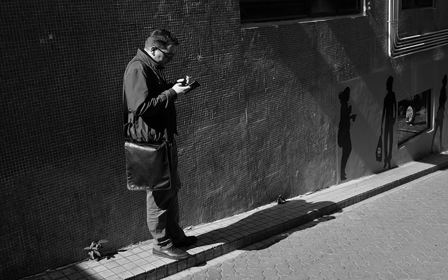 black and white photography Hong Kong man Central street art