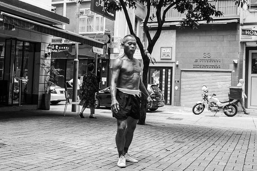 black and white photography Hong Kong man Sheung Wan