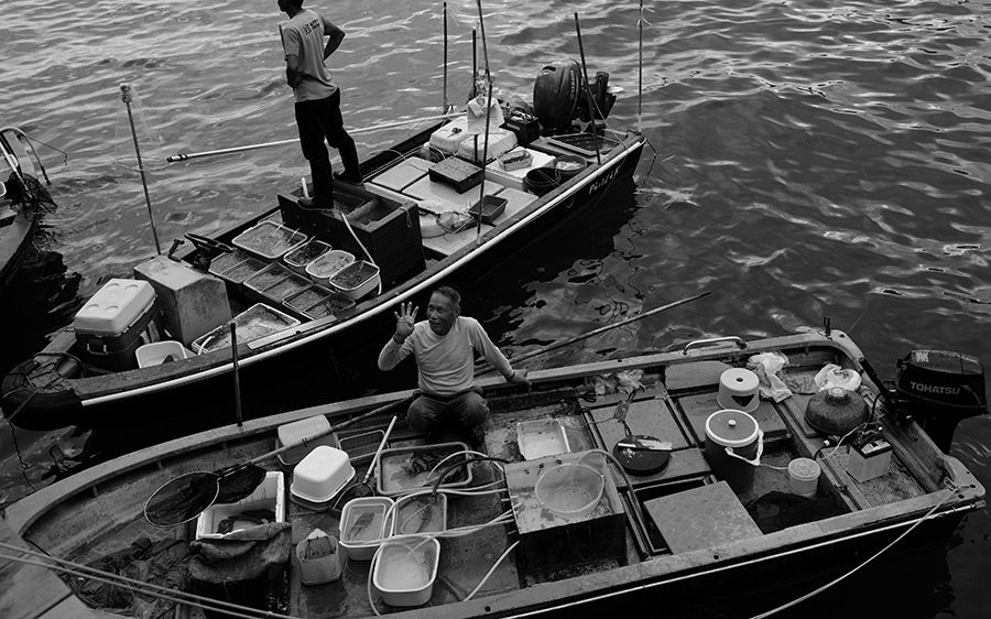 black and white photography Sai Kung Pier floating fish market
