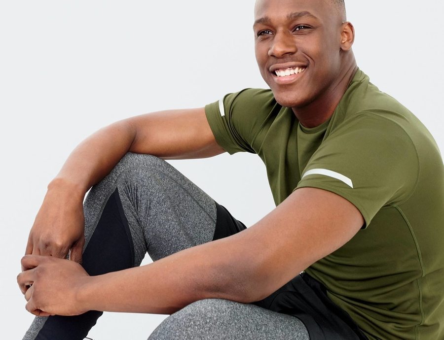 men's activewear in hong kong man wearing green tshirt