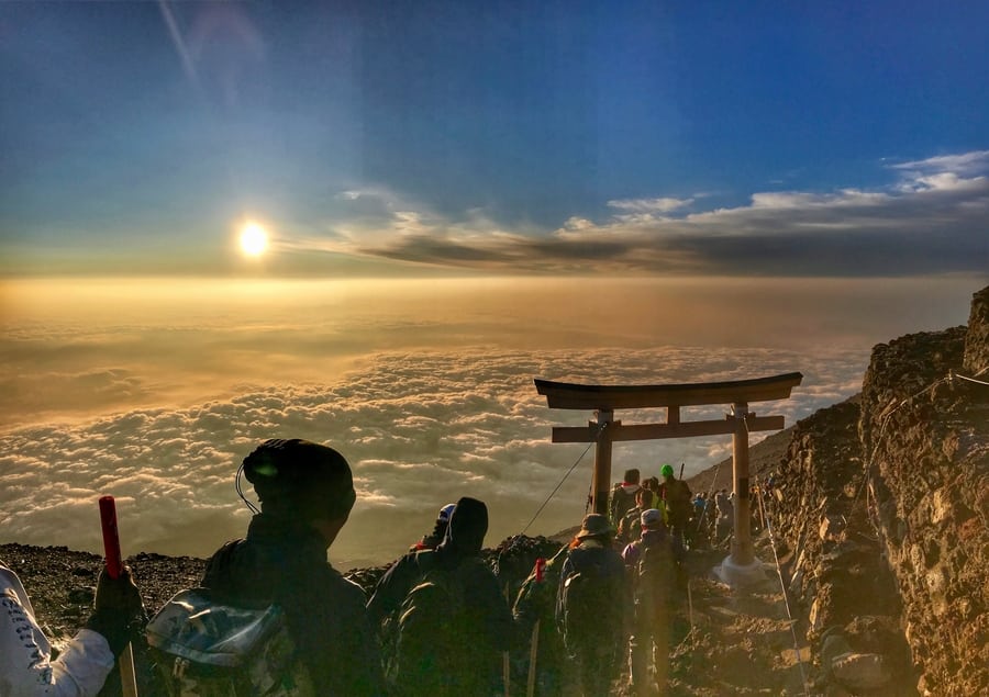 climbing Mount Fuji sunrise