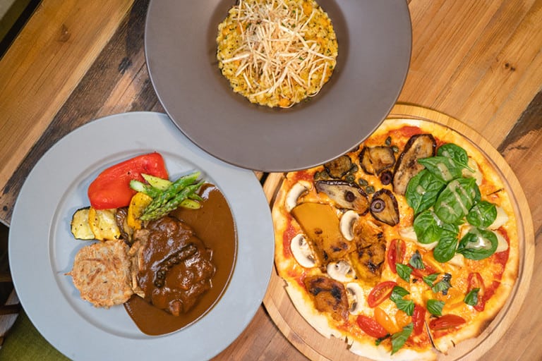 Sample scrummy vegan pizza and mushroom steaks at POP Vegan in SoHo