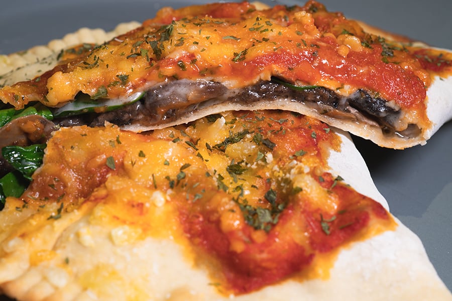 POP Vegan vegetarian restaurants in Central Truffle Mushroom Spinach Calzone