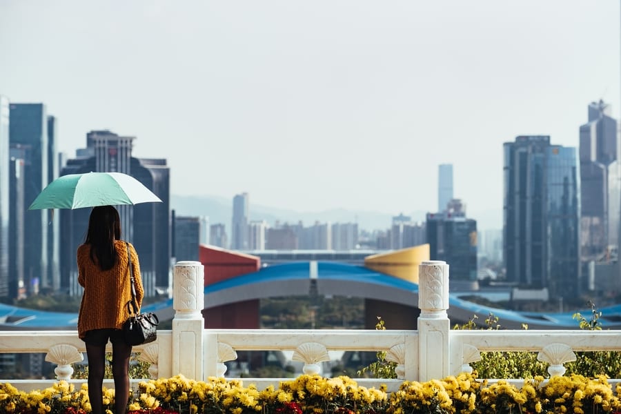 things to do in Shenzhen girl with umbrella