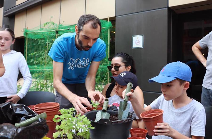 Rooftop Republic Urban Farming volunteers with kids in Hong Kong