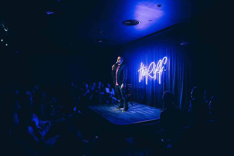 Comedian on stage at The Riff comedy club Hong Kong