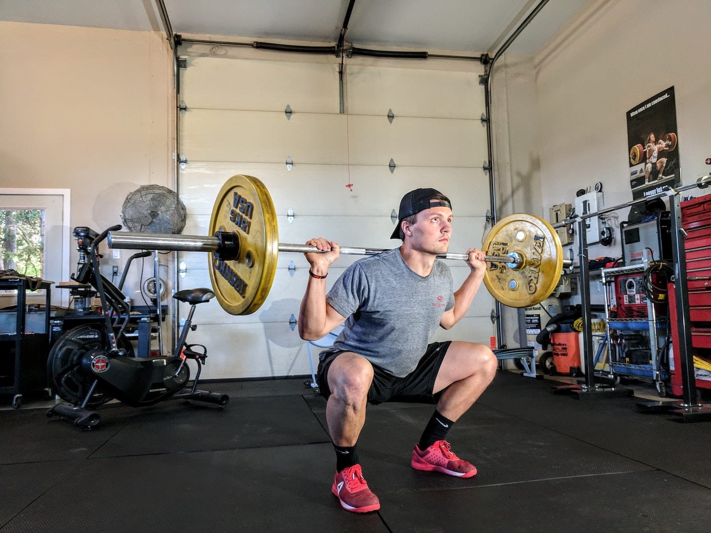 person lifting barbell